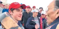  ?? KC NOLAND YOUTUBE ?? Online video shows students from Kentucky’s Covington Catholic High School taunting Nathan Phillips, right, in Washington, D.C., Friday. The school says it is investigat­ing.