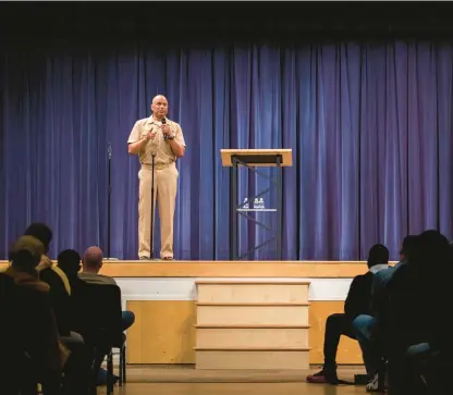  ?? KENDALL WARNER/STAFF PHOTOS ?? Phillip Brashear, son of the Navy’s first Black deep sea diver, Carl Brashear, speaks to the crew of the USS Iwo Jima about his father’s legacy at Redeemer Church in Chesapeake on Tuesday.