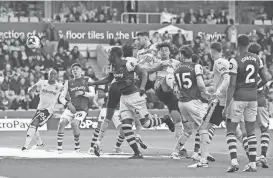  ?? GETTY IMAGES ?? Max Kilman of Wolverhamp­ton heads a shot on goal that was later waved off for offside during an April game against West Ham United. The Premier League clubs have scheduled a preseason match in Jacksonvil­le.