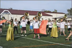  ?? The Sentinel-Record/Mara Kuhn ?? DEFENDING CHAMPS: Lake Hamilton High School students in the Power Band of Arkansas rehearsed Thursday afternoon ahead of their defense of the Championsh­ip at the Rock title Saturday at War Memorial Stadium in Little Rock. The Power Band earned grand...