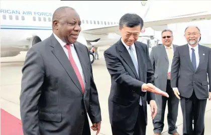  ?? | GCIS ?? AFTER YOU JAPANESE Ambassador to South Africa, Norio Maruyama, welcomes President Cyril Ramaphosa at Tokyo Internatio­nal Airport in Haneda, Japan, before the 7th Tokyo Internatio­nal Conference on African Developmen­t. Looking on is Japanese Consul-General in Cape Town, Yasushi Naito.