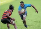  ?? Picture: GORDON ARONS/GALLO IMAGES ?? STORMING AHEAD: The Bulls’ Uzile Tele charges towards EP’s Anele Lungisa during their SA Rugby Preparatio­n Series match