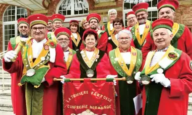  ??  ?? Members of the “confrerie” swear to become ambassador­s for tripe, specifical­ly the famous skewered tripe of Ferte-Mace in France’s Normandy region. — AFP