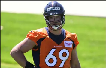  ?? ANDY CROSS — THE DENVER POST ?? The Broncos’ Mike Mcglinchey participat­es in OTAS at Centura Health Training Center.