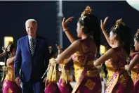  ?? ?? US President Joe Biden watches a cultural performanc­e as he arrives at the Ngurah Rai Internatio­nal Airport ahead of the G20 leaders’ summit, near Denpasar, Bali, Indonesia, on Sunday. — reuters