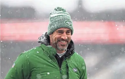  ?? BRIAN FLUHARTY/USA TODAY SPORTS ?? Jets quarterbac­k Aaron Rodgers, who missed nearly all of the 2023 season, walks off of the field Sunday before the game against the Patriots at Gillette Stadium.