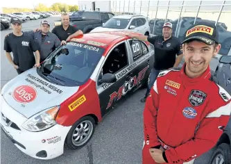  ?? CLIFFORD SKARSTEDT/EXAMINER ?? Racer Jake Exton, who raced the car this year in the Nissan Micra Cup, poses for a photo with car owner Craig Willoughby, assistant service manager Jason Robinson, senior technician Stephen Flynn and Craig Willoughby jr. on Tuesday at Trans Canada...