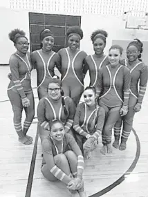  ?? Submitted photo ?? ■ Ayana Brayley-Cruz, Chloe Griffin, Anna Loanzon, Misty Lopez, Harmony Mothershed, Cymone Thomas, AnnMarie Vasquez, Alliyah Vayson and Lauryn Young won third place at the Scholastic AA Division of the North Texas Color Guard Associatio­n Championsh­ip.