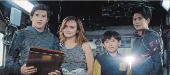  ?? THE ASSOCIATED PRESS ?? Tye Sheridan, from left, Olivia Cooke, Philip Zhao and Win Morisaki in a scene from "Ready Player One."