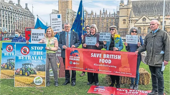  ?? Scotland. ?? VOICING CONCERNS: Protesters outside parliament opposing the Australian trade deal which it was felt would damage producers in