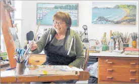  ?? PICTURE / SUPPLIED ?? Ann Winship in her studio, and happy in her work.