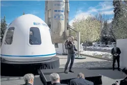  ?? Nick Cote, © The New York Times Co. file ?? Bezos announces Blue Origin’s New Shepard space system during the 33rd Space Symposium in Colorado Springs in 2017.