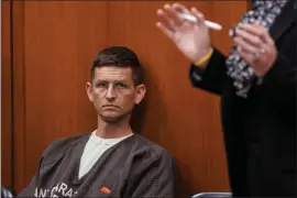  ?? DAI SUGANO - STAFF PHOTOGRAPH­ER ?? Brett Bymaster listens to attorney Renee Hessling, right, at his bail hearing at the Santa Clara Hall of Justice on April 19.