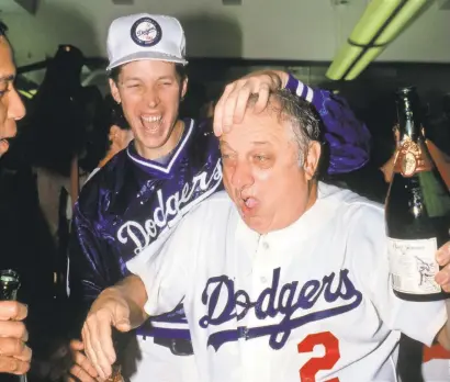  ?? GEORGE ROSE/GETTY IMAGES ?? Tommy Lasorda won four NL pennants and two World Series tiles.