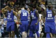  ?? KIICHIRO SATO — THE ASSOCIATED PRESS ?? Middle Tennessee State players react during the second half of an NCAA college basketball tournament first round game against Minnesota Thursday in Milwaukee.