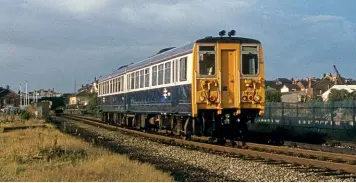  ??  ?? The single car railbuses led to a prototype two-car unit being developed. Numbered No. 140001, it is seen in service on September 21, 1981 approachin­g Ormskirk station from Preston.