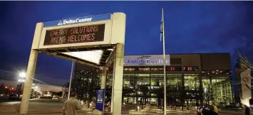  ?? STEVE C. WILSON / AP ?? The marquee in front of the Energy Solutions Arena, formerly the Delta Center, home of the Utah Jazz, shows conflictin­g signage at dusk before a game on Nov. 20, 2006, in Salt Lake City. The Arizona Coyotes are expected to move to Salt Lake City and play in the venue starting next season. It would be the franchise’s third location since joining the league from the World Hockey Associatio­n in 1979.