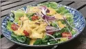  ?? LIGAYA FIGUERAS / LIGAYA.FIGUERAS@AJC.COM ?? You can spice up your mealtime routine with Creole Caesar Salad with Cornbread Croutons, adapted from “Meals, Music, and Muses” by Alexander Smalls (Flatiron Books, $35).