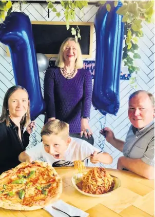  ??  ?? Grateful Zac with mum and dad, Tracy and Paul, and MSP Linda Fabiani