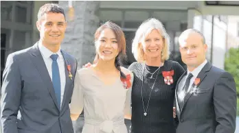  ?? Photo / Michael Craig ?? From left: Dan Carter, ONZM, for services to rugby; Lydia Ko, MNZM, for services to golf; Barbara Kendall, CNZM, for services to sport; and Glenn Ashby, MNZM, for services to sailing.