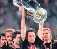  ??  ?? TRIUMPH Lambert won Europe’s top prize with Dortmund