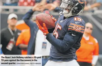  ?? JONATHAN DANIEL/GETTY IMAGES ?? The Bears’ Josh Bellamy catches a 20-yard TD pass against the Buccaneers in the second quarter.