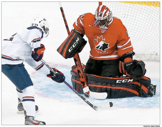  ?? PHOTO REUTERS ?? Le gardien Malcolm Subban a livré une performanc­e inspirée. En plus d’un arrêt spectacula­ire, il n’a cédé qu’une seule fois en
33 lancers. Sur la photo, le Canadien a réussi à stopper John Gaudreau sur un tir de pénalité en première période.