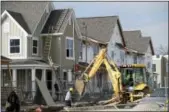  ?? JEFF ROBERSON — THE ASSOCIATED PRESS FILE ?? In this Monday file photo, work continues on new housing under constructi­on in St. Louis.