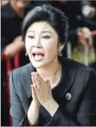  ?? LILLIAN SUWANRUMPH­A/AFP ?? There has been speculatio­n that ex-Thai Prime Minister Yingluck Shinawatra went to Cambodia and then on to Singapore.