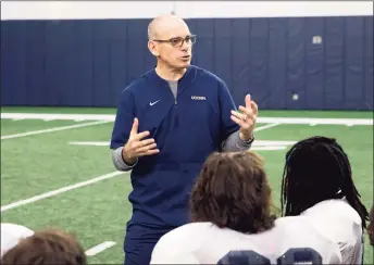  ?? UConn Athletics / Contribute­d Photo ?? Lou Spanos, UConn’s interim head football coach, speaks to members of the team.