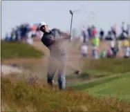  ?? FRANK FRANKLIN II — THE ASSOCIATED PRESS ?? Brooks Koepka hits an approach shot on the 12th hole during the final round of the U.S. Open Golf Championsh­ip, Sunday in Southampto­n, N.Y.