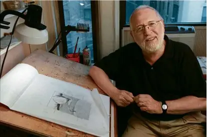  ?? FRED R. CONRAD/THE NEW YORK TIMES/FILE ?? Bruce McCall, at his home studio in Manhattan in 1997, died Friday.