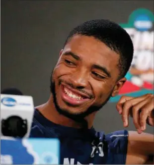  ?? BRYNN ANDERSON — THE ASSOCIATED PRESS ?? Villanova’s Mikal Bridges laughs during a news conference for the championsh­ip game of the Final Four NCAA college basketball tournament Sunday in San Antonio.