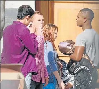  ?? Picture: FREDLIN ADRIAAN ?? COURT SEQUEL: Chatting outside the Port Elizabeth Regional Court are murder accused, from left, Kevin Barrington, Dylan Senekal and Hezeron Webber