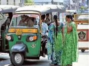  ?? GIRI ?? Women boarding autos at Benz Circle in Vijayawada on Friday. Over 80% of their passengers comprise women and collegegoe­rs, say auto drivers.K.V.S.