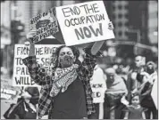  ?? Irfan Khan Los Angeles Times ?? PROTESTERS GATHER in Westwood on Saturday, the 73rd anniversar­y of the “nakba,” a reference to Palestinia­ns’ displaceme­nt in a 1948 Arab-Israeli war.