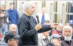  ?? GUARDIAN FILE PHOTO ?? Three Rivers area resident Michael Pagé speaks during a public meeting Nov. 7 at Montague Regional High School on the proposed amalgamati­on of the region.