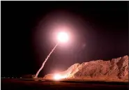  ?? AP ?? A missile is fired from the city of Kermanshah in western Iran targeting the Islamic State group in Syria, in this photo released on Monday by the Iranian Revolution­ary Guard.