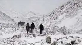  ??  ?? In this March 11, 2017 photo, trekkers hike towards Everest Base camp near Lobuche, Nepal. —AP