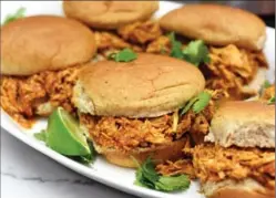  ?? KARON LIU, TORONTO STAR ?? Make barbecue pulled chicken sandwiches with a slow cooker if you prefer the “set it and forget it” approach to cooking.