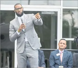  ?? PHIL LONG — ASSOCIATED PRESS ?? Speaking at the opening ceremony for the I Promise School in Akron, Ohio, on Monday, LeBron James didn’t rule out that he could someday return to playing in Cleveland.