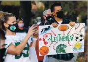  ?? DOUG DURAN — STAFF ARCHIVES ?? De La Salle parent Jim Wardy of Lafayette participat­es in a “Let Them Play CA” rally in Concord on Jan. 15.