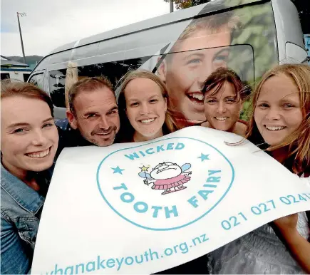  ?? MARTIN DE RUYTER/STUFF ?? Ruth Rogers, left, project leader of the Wicked Tooth Fairy initiative, Jeff Bryant, Nayland College dean, Georgia Abrey, Nayland College student, Hannah Cameron, Nayland College house dean and Zoe Jurgeleit, Nayland College student promote the new...