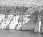  ?? AP ?? Lake Powell water levels hit a historic low amid the West’s megadrough­t. The change was visible at Antelope Point Marina near Page, Ariz., in 2021.