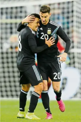  ?? — Reuters ?? Opportunis­t: Argentina’s Lucas Alario (right) celebratin­g with a teammate after scoring against Germany during a friendly at the Signal Iduna Park in Dortmund on Wednesday.