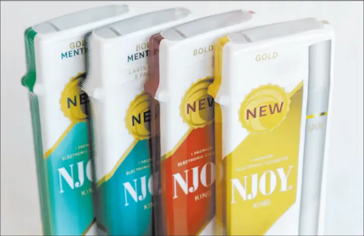  ?? Steve Helber The Associated Press ?? Altria invested $2.75 billion in electronic cigarette startup NJOY just days after exiting its stake in troubled electronic cigarette maker Juul.