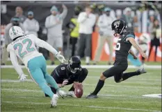  ?? AP photo ?? Jacksonvil­le’s Matthew Wright kicks a field goal to win the match during the second half of an NFL football game between the Miami Dolphins and the Jacksonvil­le Jaguars at the Tottenham Hotspur stadium in London, England on Sunday.