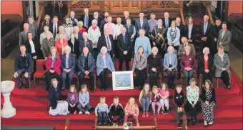  ?? ?? Reverend William Crossan, centre, with members of the Lorne and Lowland Church congregati­on during his final Sunday service.