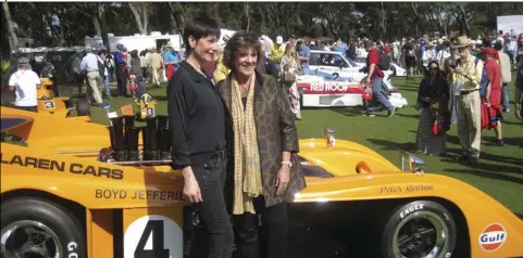  ??  ?? Lyn St James and Jennifer Revson with the ex-Peter Revson McLaren M20 at the Amelia Island Concours