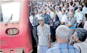  ??  ?? The scene at Fort Railway station on Friday. Pic by Anurada Bandara